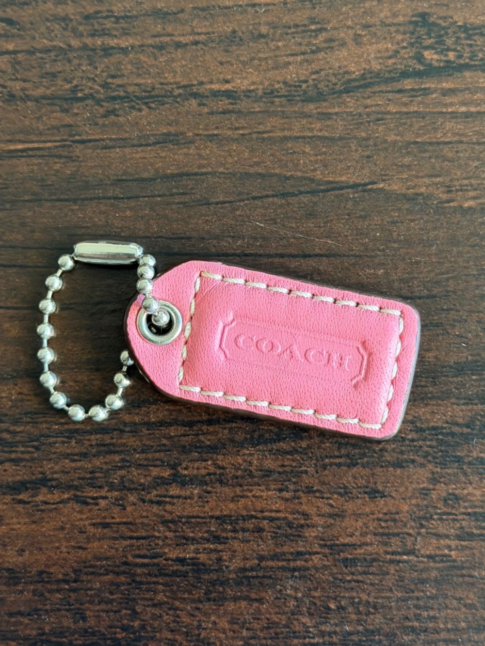 Coach bubblegum pink leather hangtag